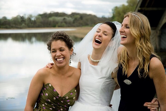 Laughing with bridesmaids