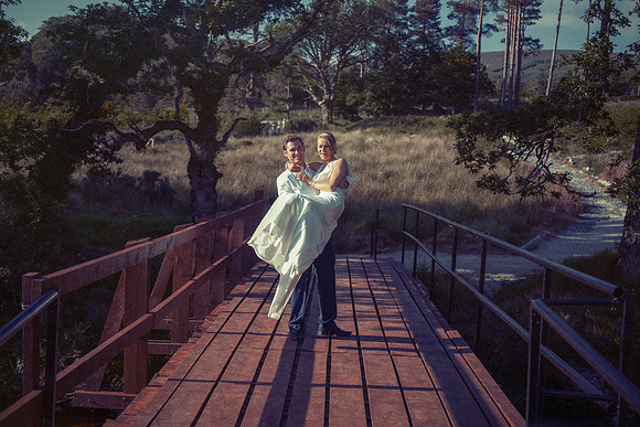 Carrying the bride over the bridge