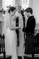 Clara and Odie holding hands at their ceremony
